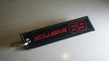 Xclusive 69 Flight Tag Keychain